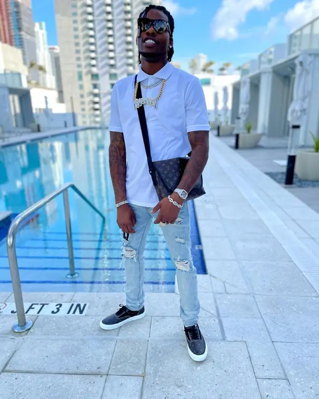 CJ So Cool outfit in Amiri and Louis Vuitton, 2021