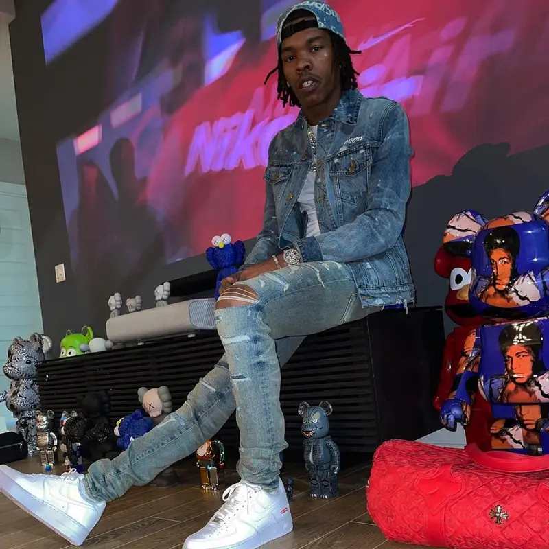 Lil Baby outfit in Amiri, Nike, and Supreme, 2021
