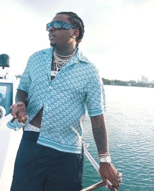 Gunna outfit in Dior, Louis Vuitton, and Versace, 2021