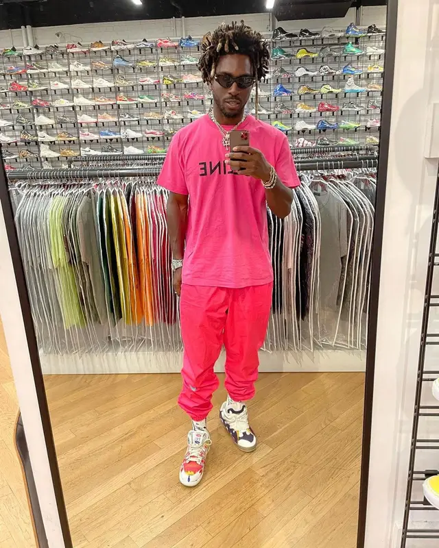Saint JHN outfit in Celine, Nike, and Christian Sex Club, 2021