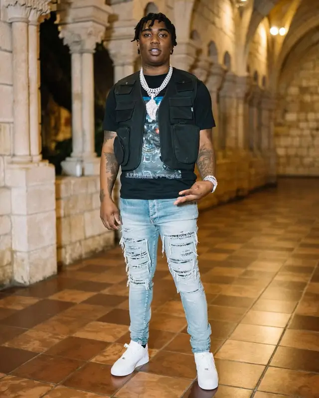 Fredo Bang outfit in Etudes, Amiri, and Nike, 2021
