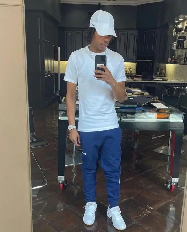 Lil Baby outfit in Nike and Drake Merch, 2021