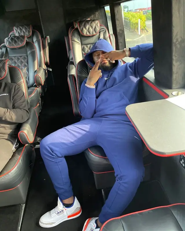 Headie One outfit in Nike, Jordan, and Drake Merch, 2021