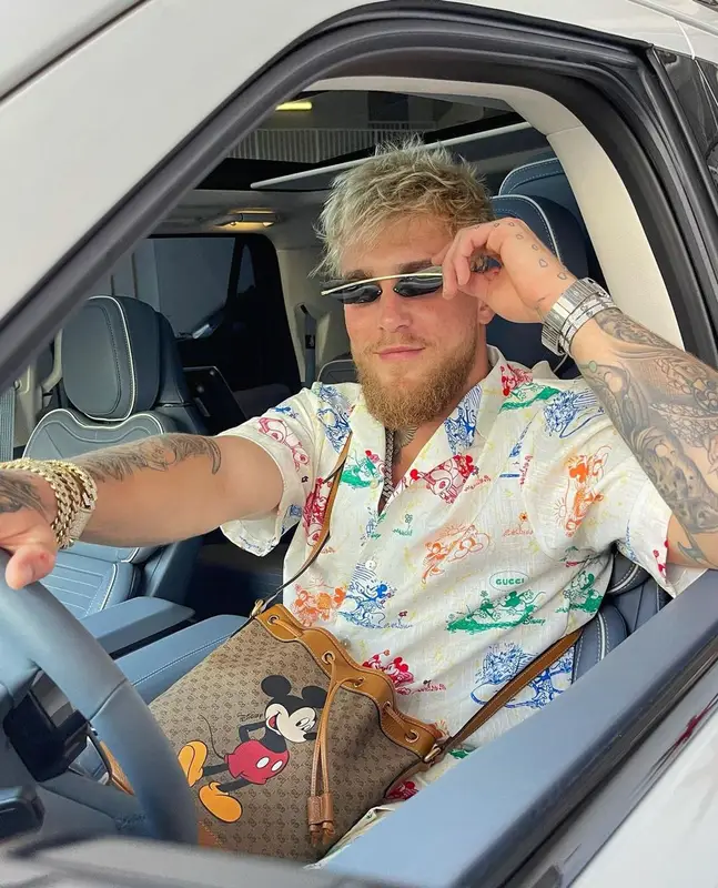 Jake Paul outfit in Gucci, Poppy Lissiman, and Disney, 2021