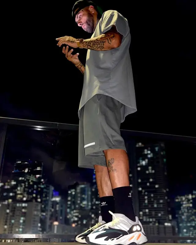 Nicky Jam outfit in Undergold, Yeezy, and Adidas, 2021