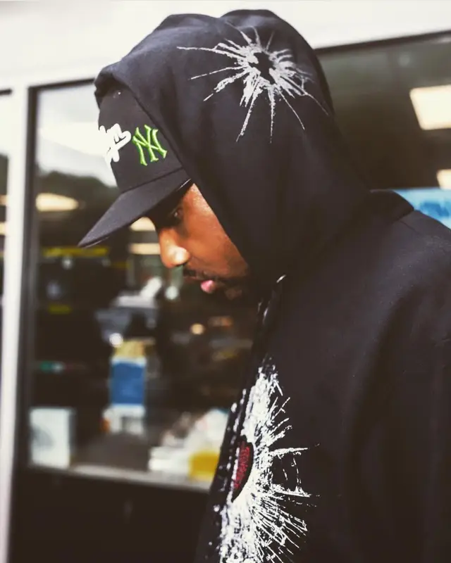 Fabolous outfit in Blood's Thicker, Nike, and Drake Merch, 2021