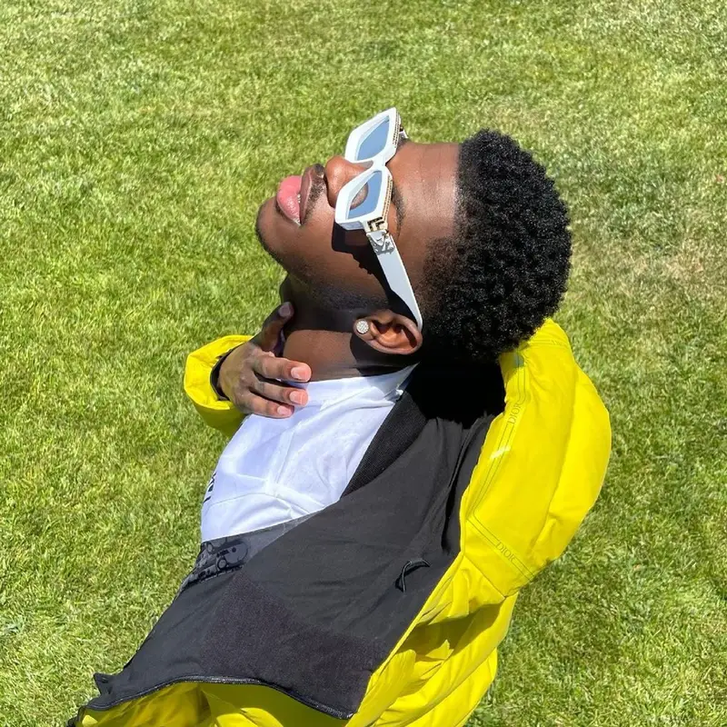 Lil Nas X outfit in Dior, Versace, and Louis Vuitton, 2021