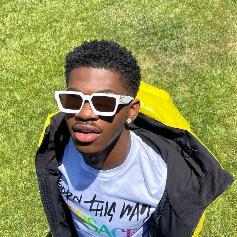 Lil Nas X outfit in Dior, Versace, and Louis Vuitton, 2021