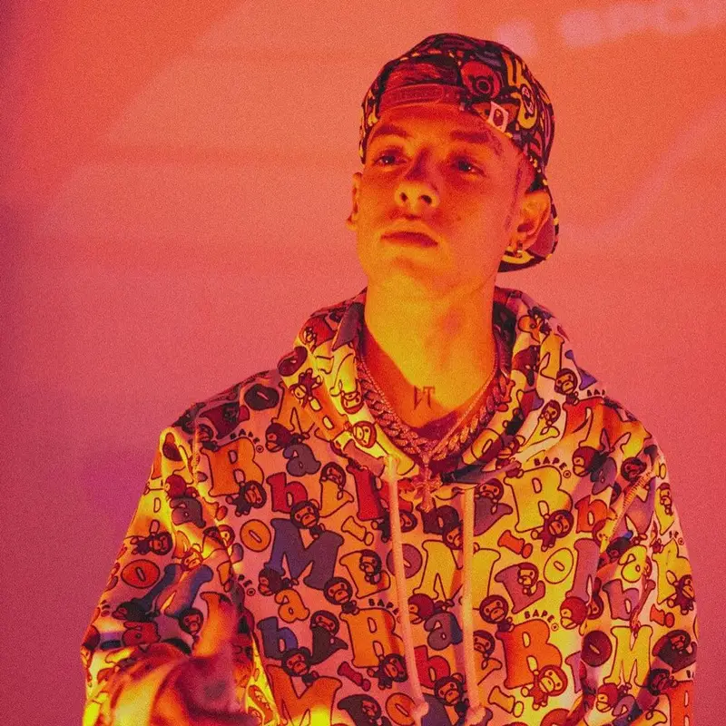 Natanael Cano outfit in Nike, Louis Vuitton, and Bape, 2021