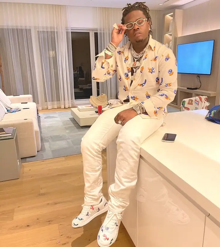 Gunna outfit in Dior, Cartier, and Kenny Scharf, 2021