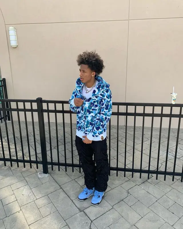 Mikey outfit in Nike, Bape, and Drake Merch, 2021