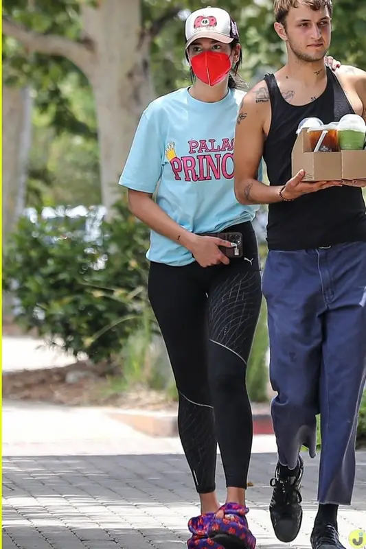 Dua Lipa outfit in Palace, Puma, and Natasha Zinko, 2021