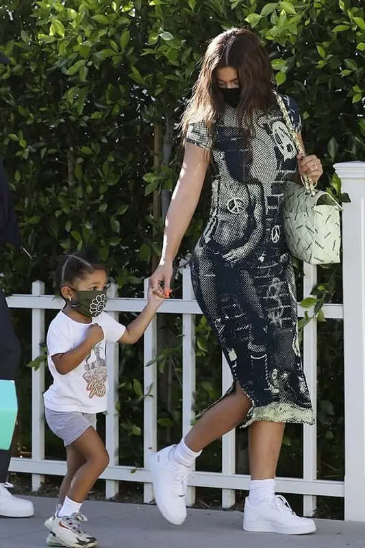 Kylie Jenner outfit in Supreme, Chanel, and Skims, 2020