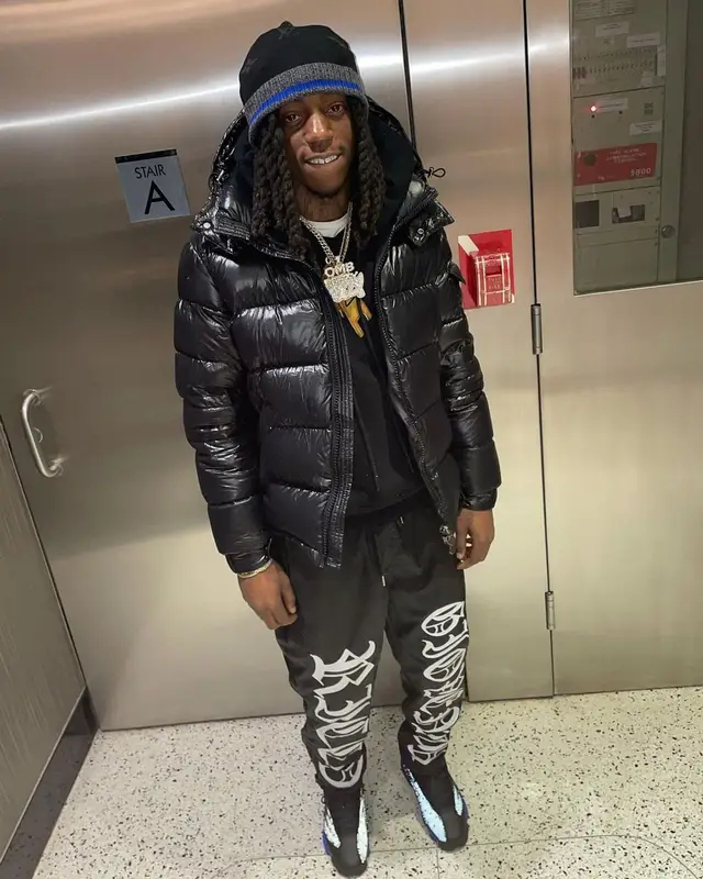 OMB Peezy outfit in Moncler, Jordan, and Louis Vuitton, 2021
