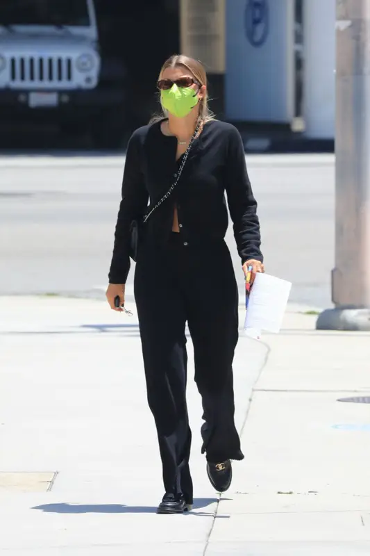 Sofia Richie outfit in Versace, Chanel, and Maskc, 2021