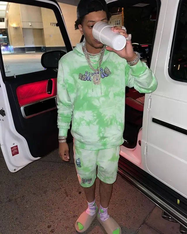 Lil Migo outfit in Ripndip, Bally, and Yeezy, 2021