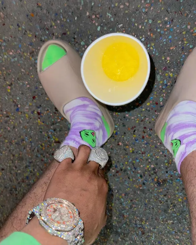 Lil Migo outfit in Ripndip, Bally, and Yeezy, 2021