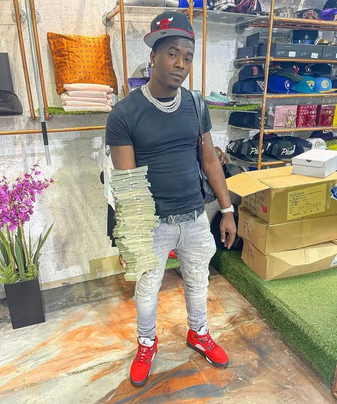 Bankroll Freddie outfit in Polo Ralph Lauren, Louis Vuitton, and New Era, 2021