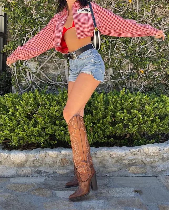 Dua Lipa outfit in Miu Miu, Dsquared2, and Vivienne Westwood, 2021