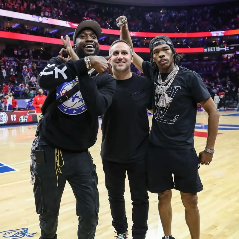 Meek Mill outfit in Rhude, Adidas, and New Era, 2021