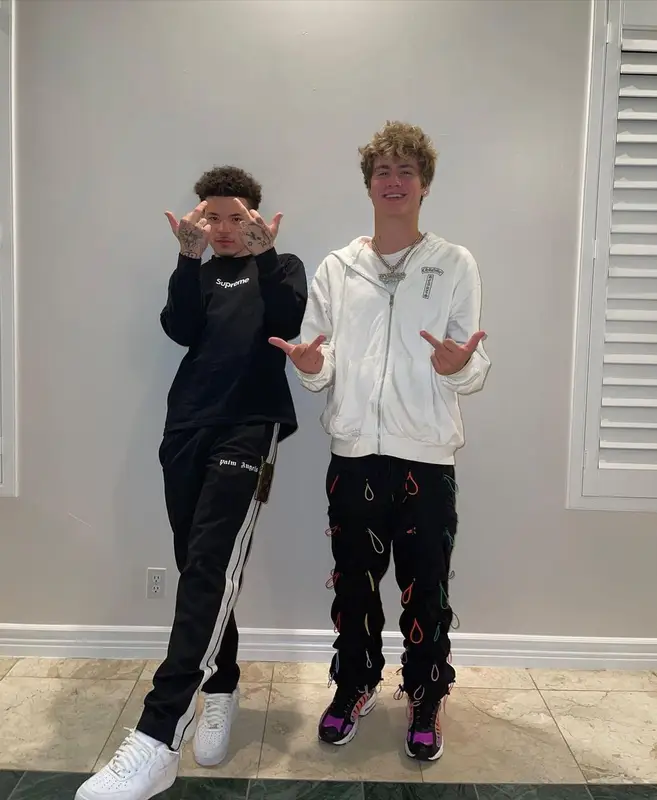Lil Mosey outfit in Supreme, Palm Angels, and Louis Vuitton, 2021
