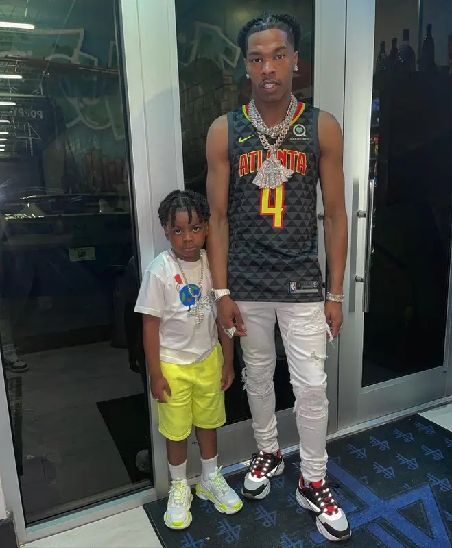 Lil Baby outfit in Atlanta Hawks, Amiri, and Dior, 2021