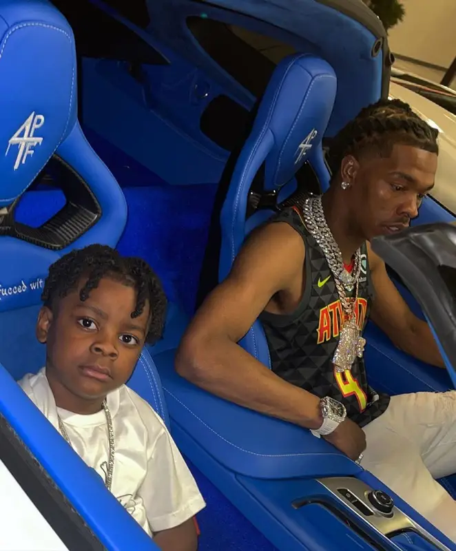 Lil Baby outfit in Atlanta Hawks, Amiri, and Dior, 2021