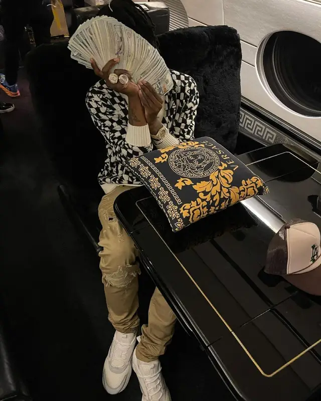 Polo G outfit in Amiri, Dior, and Louis Vuitton, 2021