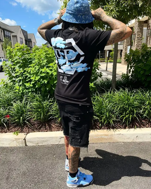 Young M.A outfit in Philipp Plein, Represent, and Marine Serre, 2021