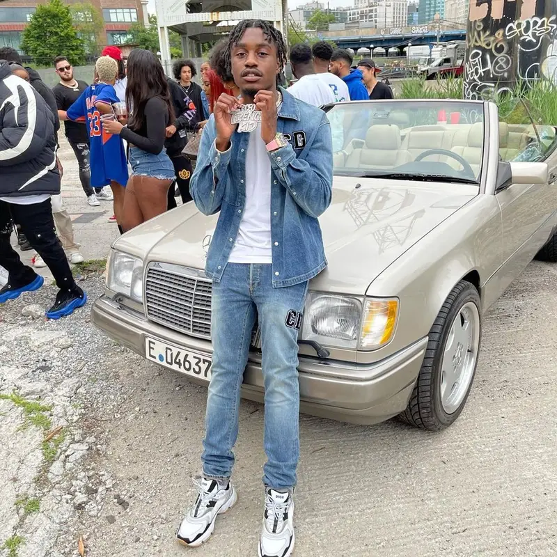 Lil Tjay outfit in Dior and Kenny Scharf, 2021