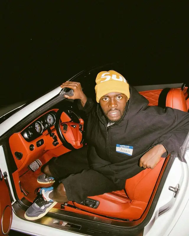 Sheck Wes outfit in Balenciaga, Jordan, and Supreme, 2021