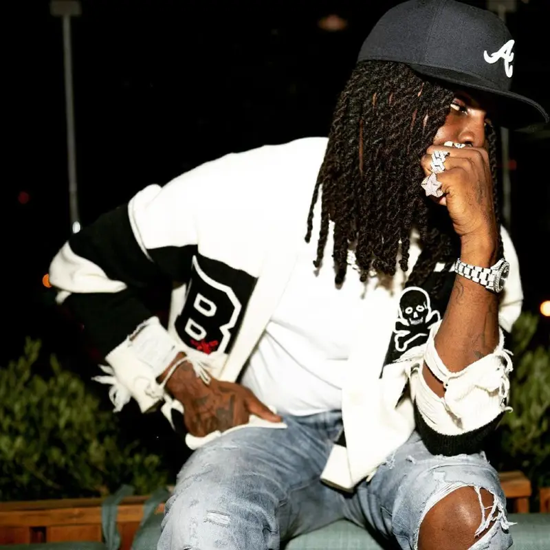 Chief Keef outfit in Kam Vercetti, Louis Vuitton, and New Era, 2021