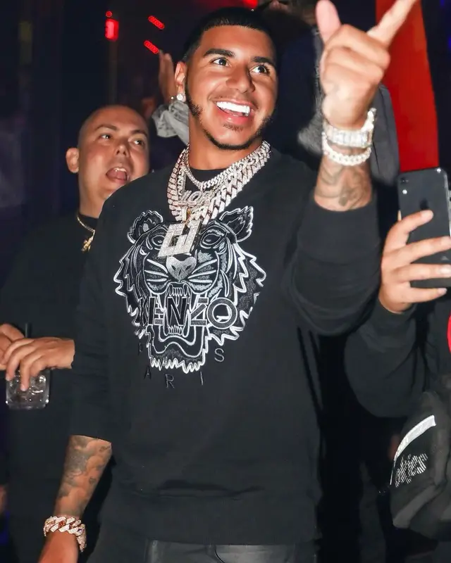 CJ outfit in Kenzo, Rta, and Prada, 2021