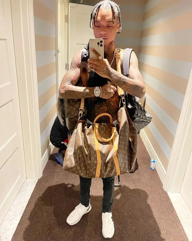 Swae Lee outfit in Chanel, Louis Vuitton, and Dior, 2021