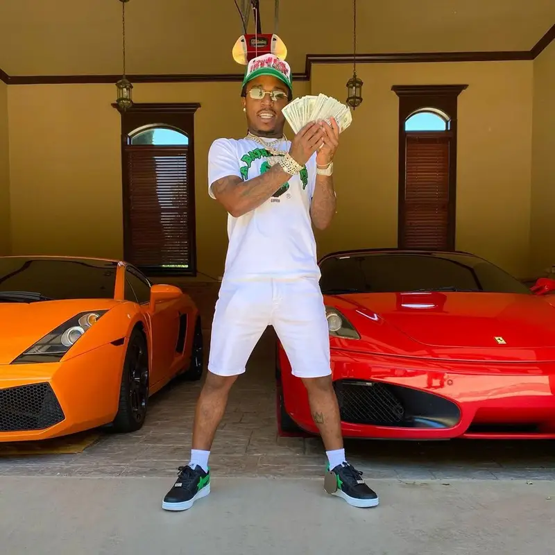 Jacquees outfit in Bape, Cartier, and Gunna Merch, 2021