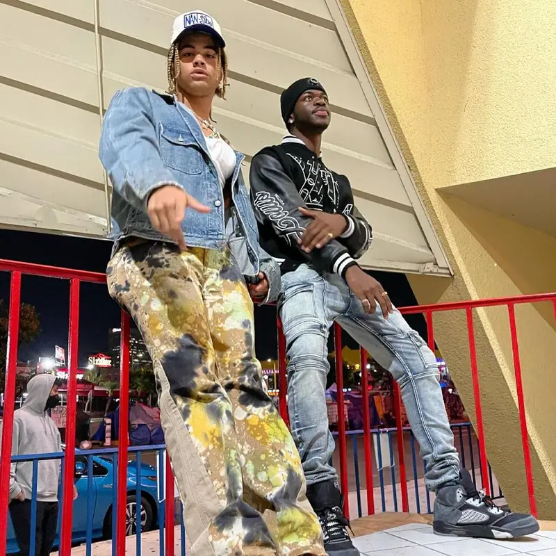 Lil Nas X outfit in Louis Vuitton, Jordan, and NBA, 2021