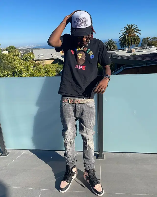 Dro Kenji outfit in Bape, Nike, and Gucci, 2021