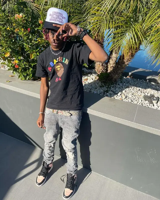 Dro Kenji outfit in Bape, Nike, and Gucci, 2021