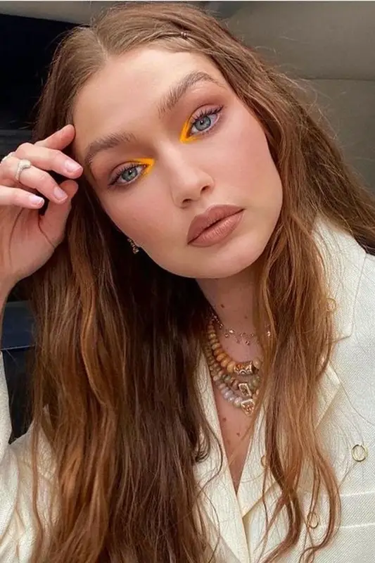 Gigi Hadid outfit in Jacquemus and Jacquie Aiche, 2021