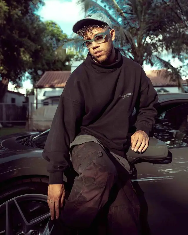 Jhay Cortez outfit in Fear of God, Off-White, and Tiffany&Co, 2021