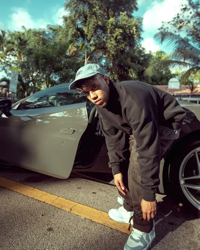 Jhay Cortez outfit in Fear of God, Off-White, and Tiffany&Co, 2021