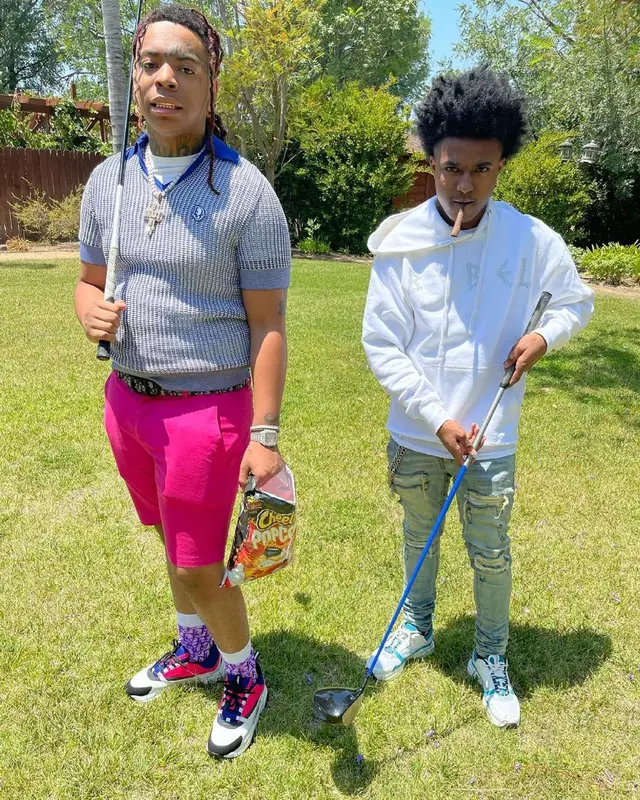 Lil Gotit outfit in Dior and Cheetos , 2021