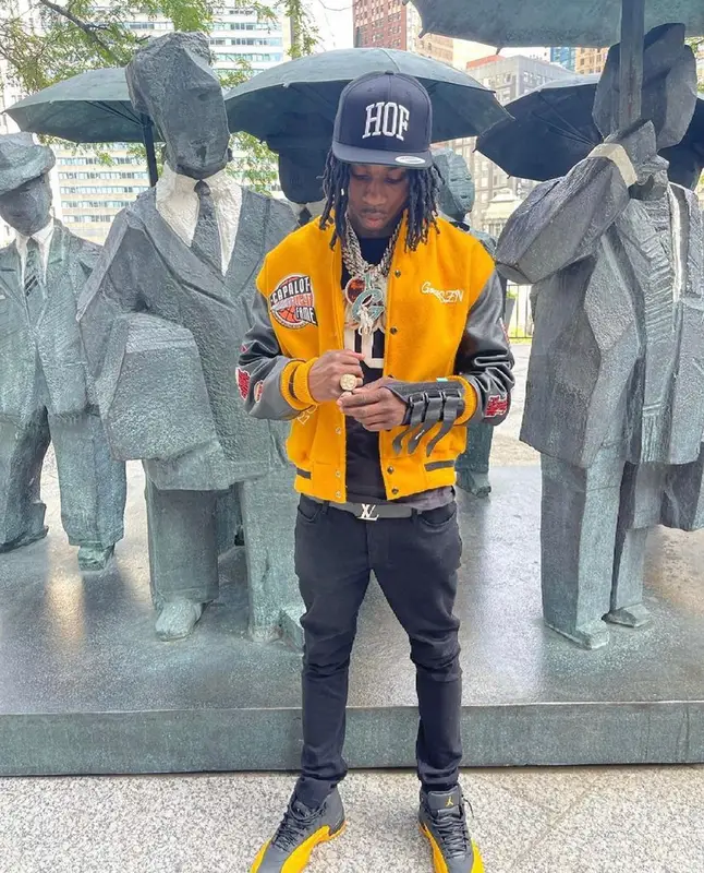 Polo G outfit in Amiri, Louis Vuitton, and Polo G Merch, 2021