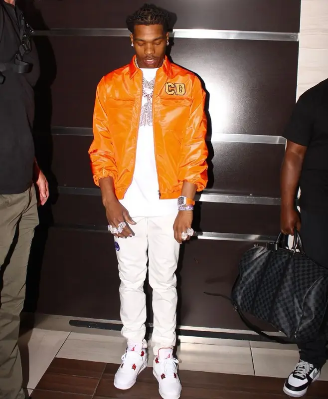 Lil Baby outfit in Dior, Jordan, and Kenny Scharf, 2021
