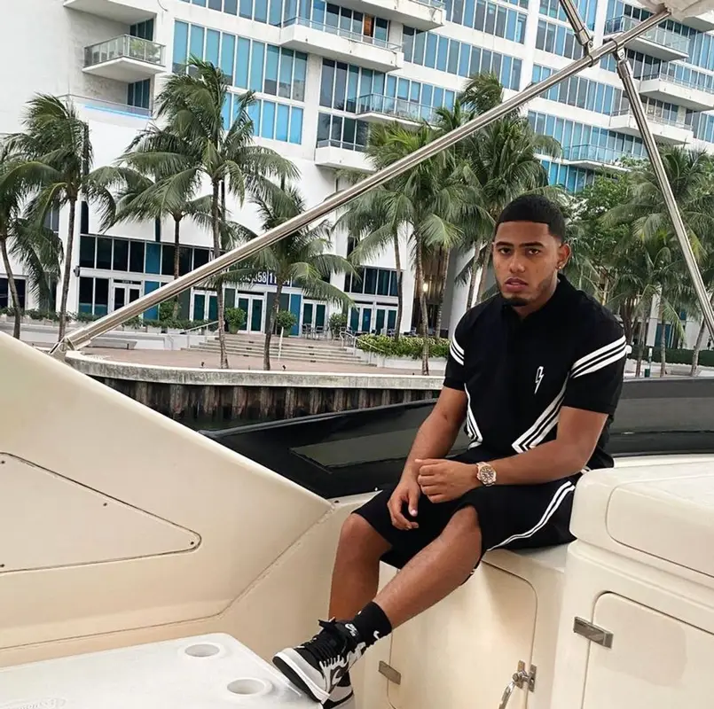 Myke Towers outfit in Neil Barrett and Nike, 2021