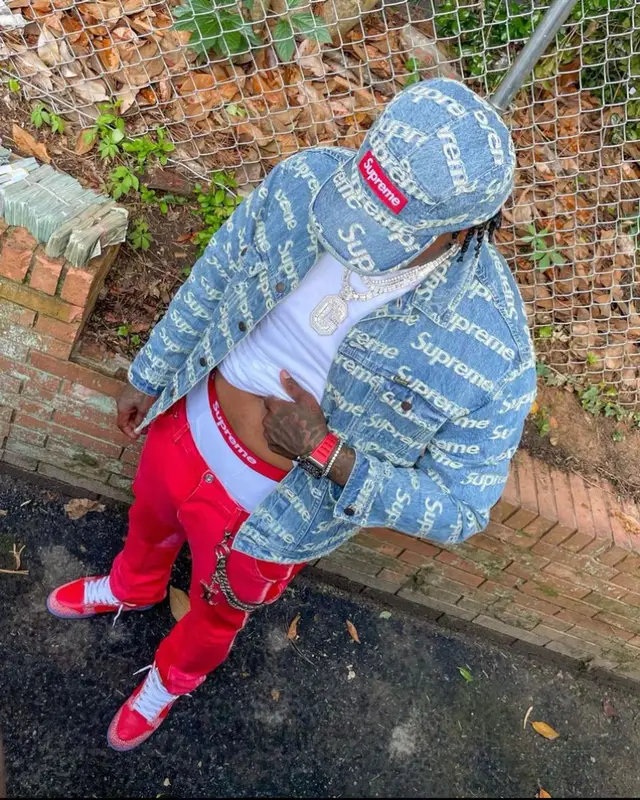 Moneybagg Yo outfit in Nike and Supreme, 2021