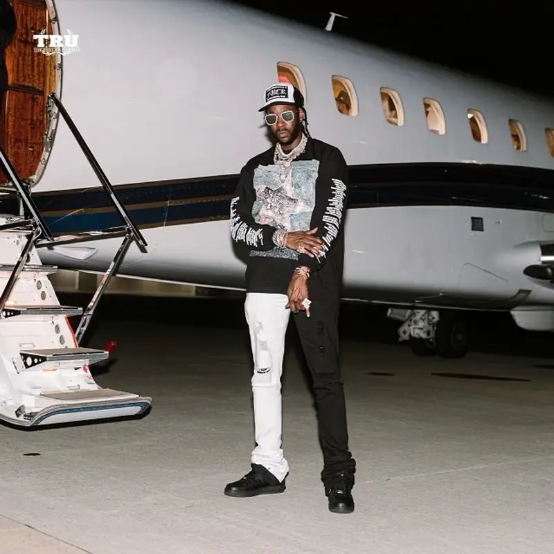 2 Chainz outfit in The Incorporated, Louis Vuitton, and Chrome Hearts, 2021