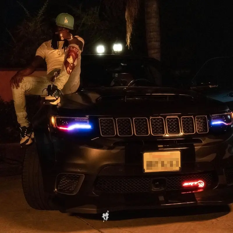 Chief Keef outfit in Polo Ralph Lauren, Amiri, and New Era, 2021
