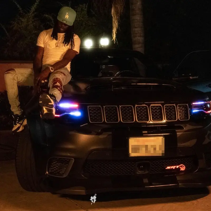 Chief Keef outfit in Polo Ralph Lauren, Amiri, and New Era, 2021