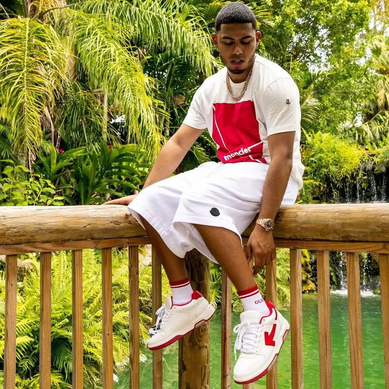 Myke Towers outfit in Moncler, Off-White, and Gucci, 2021